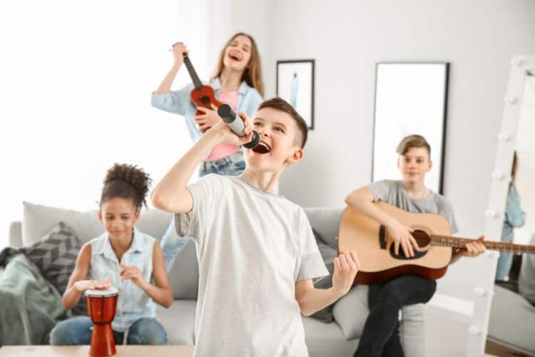 Teenagers Playing and Singing at Home