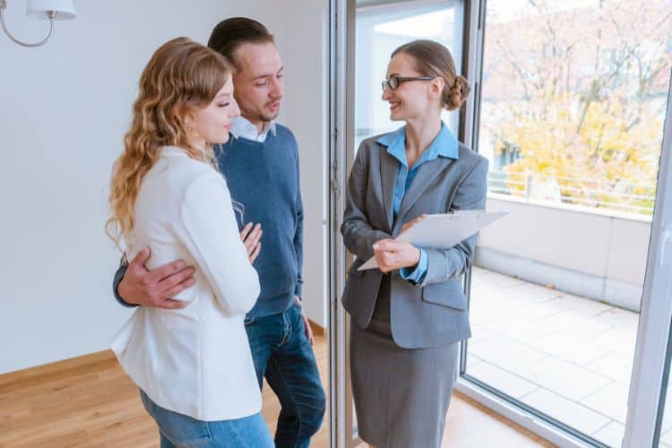 Landlord Showing Potential Tenants an Apartment